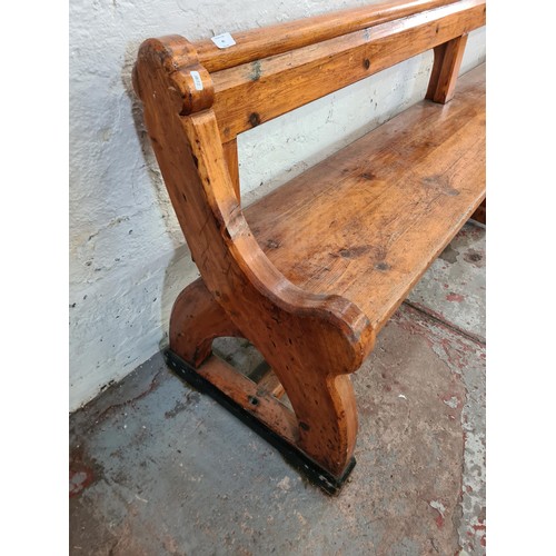 245 - A 19th century Augustus Pugin style pine church pew - approx. 80cm high x 265cm long x deep