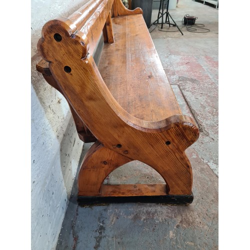 246 - A 19th century Augustus Pugin style pine church pew - approx. 80cm high x 265cm long x deep