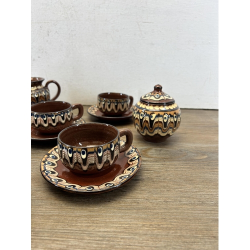 413 - A 1960s Romanian drip glazed sixteen piece miniature tea set