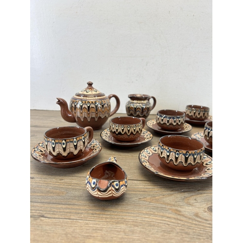 413 - A 1960s Romanian drip glazed sixteen piece miniature tea set