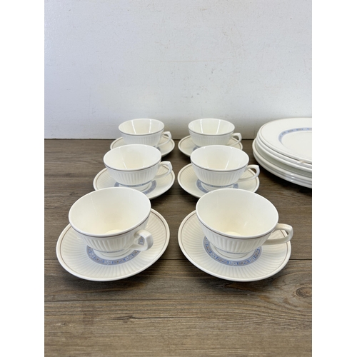 420 - Eighteen pieces of Wedgwood Metallised bone china, six cups, six saucers and six dinner plates