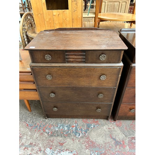 82 - A Stag oak chest of four drawers