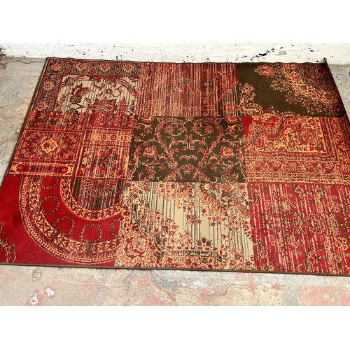 140 - A Kukoon red rug - approx. 280cm x 190cm