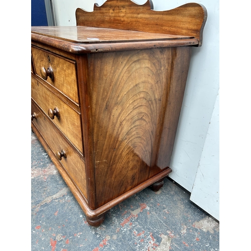 100 - A Victorian mahogany chest of two short over two long drawers with galleried back