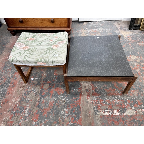 101 - Two pieces of teak furniture, one G Plan dressing table stool and one black laminate side table