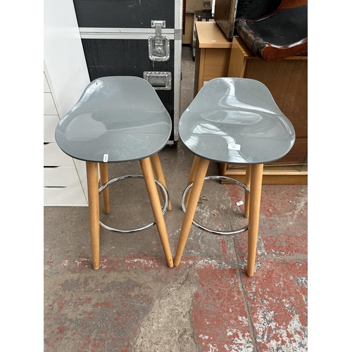 175 - A pair of grey plastic and beech kitchen bar stools