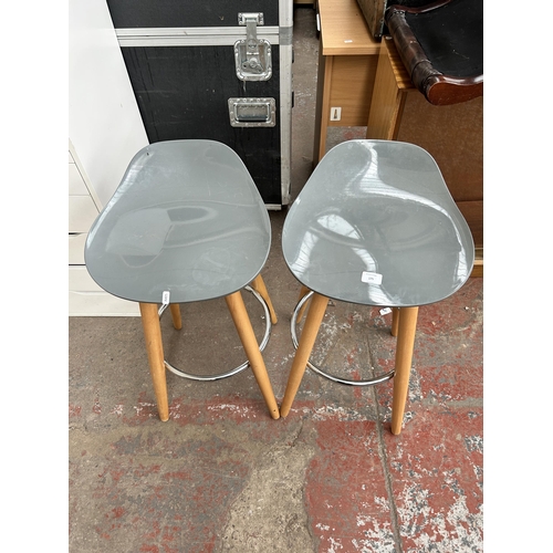 175 - A pair of grey plastic and beech kitchen bar stools
