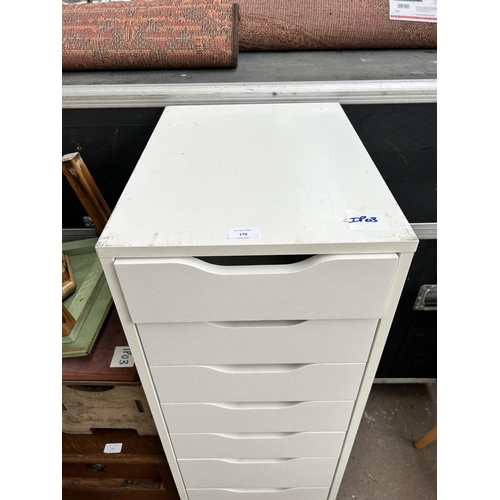 176 - A white laminate chest of nine drawers