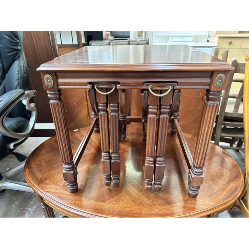 182 - Two pieces of French Empire style mahogany and brass decorated furniture, one nest of tables and one... 