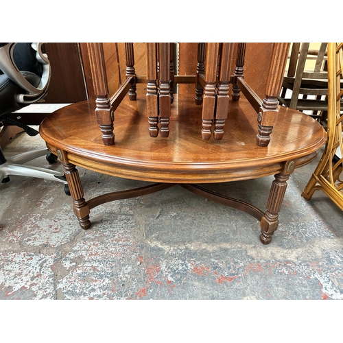 182 - Two pieces of French Empire style mahogany and brass decorated furniture, one nest of tables and one... 