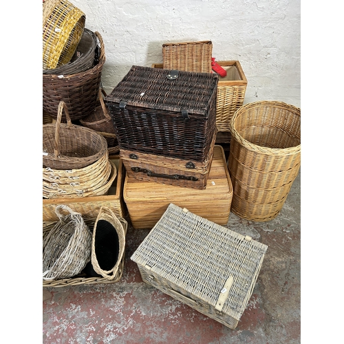 187 - A large collection of wicker baskets