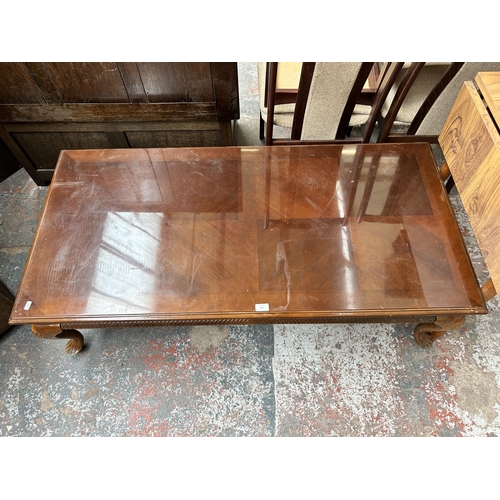 194 - A mahogany rectangular coffee table with cabriole supports