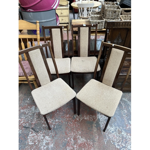 201 - A set of four mid 20th century beech and fabric upholstered dining chairs