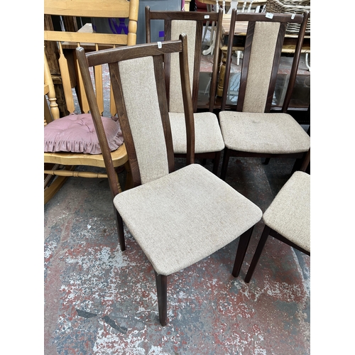 201 - A set of four mid 20th century beech and fabric upholstered dining chairs