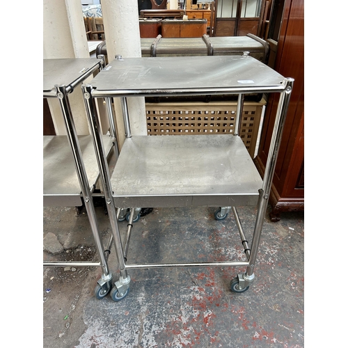 238 - A pair of Sunflower Medical Furniture stainless steel surgical trolleys