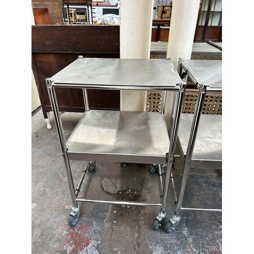 238 - A pair of Sunflower Medical Furniture stainless steel surgical trolleys