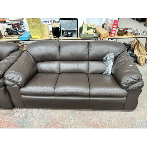 239 - An Italian brown leather three piece lounge suite comprising three seater sofa, armchair and reclini... 