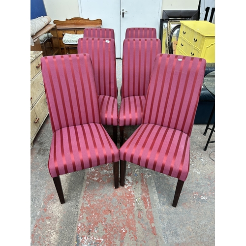 92 - A set of six burgundy fabric upholstered dining chairs