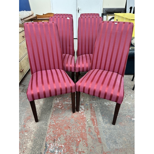 92 - A set of six burgundy fabric upholstered dining chairs