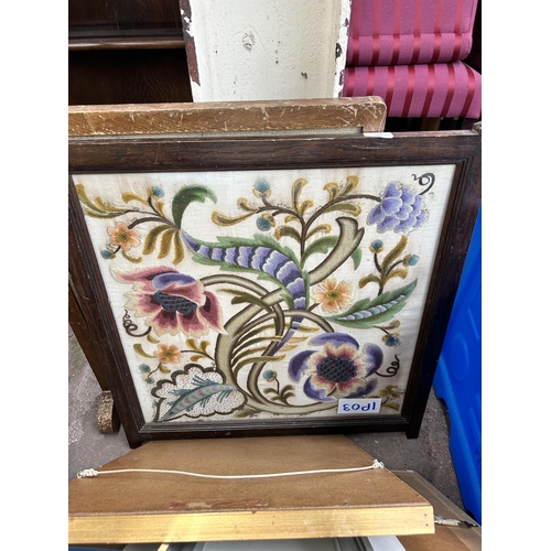 94 - A collection of pictures to include oak framed floral embroidery, oak framed tapestry fire screen, I... 