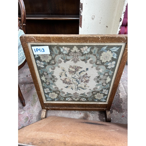 94 - A collection of pictures to include oak framed floral embroidery, oak framed tapestry fire screen, I... 