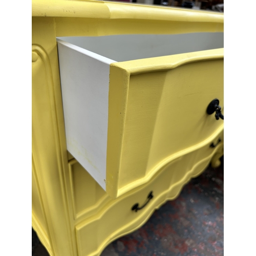98 - A French style yellow painted chest of three drawers with cabriole supports - approx. 92cm high x 12... 