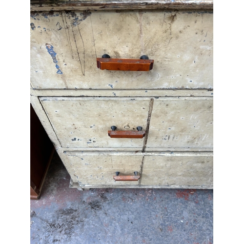 105 - A Victorian painted pine chest of two short over two long drawers with mounted Record no. 0 cast iro... 