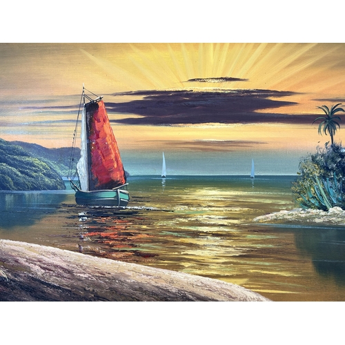 266 - A framed oil on board of a seascape - approx. 61cm high x 111cm wide