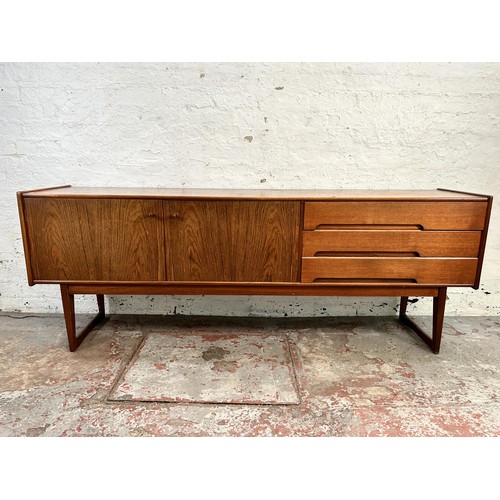 139 - An A. Younger Ltd. teak sideboard with three drawers and two cupboard doors