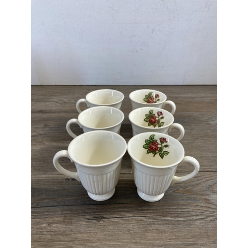 383 - A collection of Wedgwood Moss Rose china