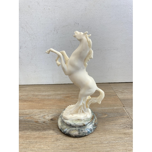 385 - Four horse figurines to include Royal Doulton Spirit of Youth, Royal Doulton Adventure etc.