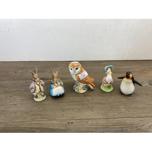 395 - Seventeen ceramic animal figurines to include two Beswick donkeys, Beswick no. 2026 barn owl, Beswic... 