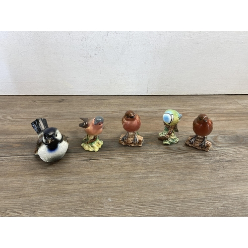 400 - Fourteen ceramic animal figurines to include Beswick Ch. Sugar of Wendover, Poole Pottery dolphin, B... 