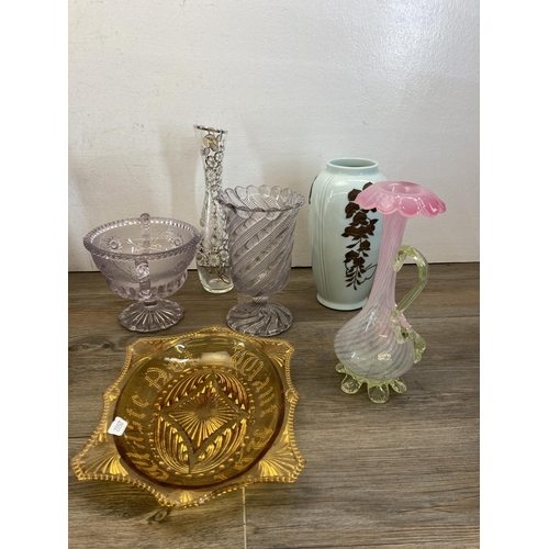 404 - A collection of Victorian and later glassware to include pair of John Walsh uranium and vaseline gla... 