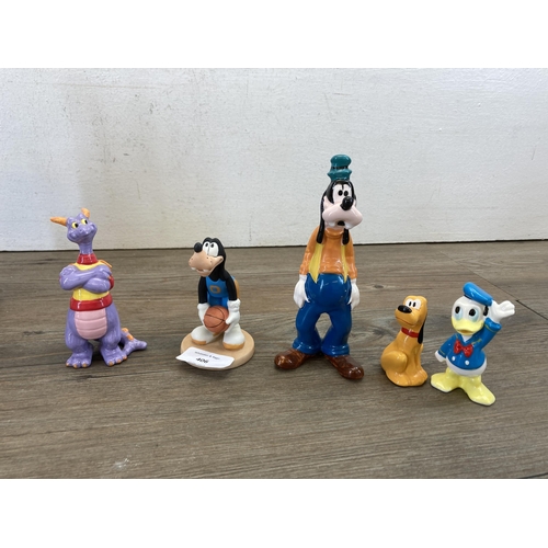 406 - A collection of Walt Disney figurines