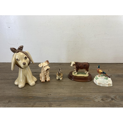 410 - A collection of ceramic figurines to include Royal Doulton Be Prepared Bunnykins, Beswick pheasant a... 