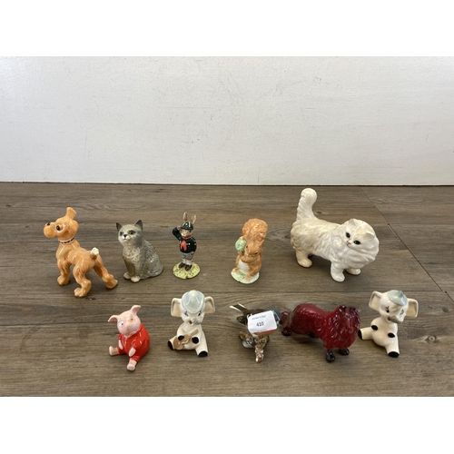 410 - A collection of ceramic figurines to include Royal Doulton Be Prepared Bunnykins, Beswick pheasant a... 