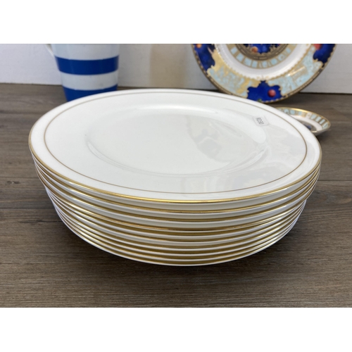 424 - Thirteen pieces of ceramics, Ten Royal Worcester dinner plates, two pieces of Royal Worcester To Cel... 