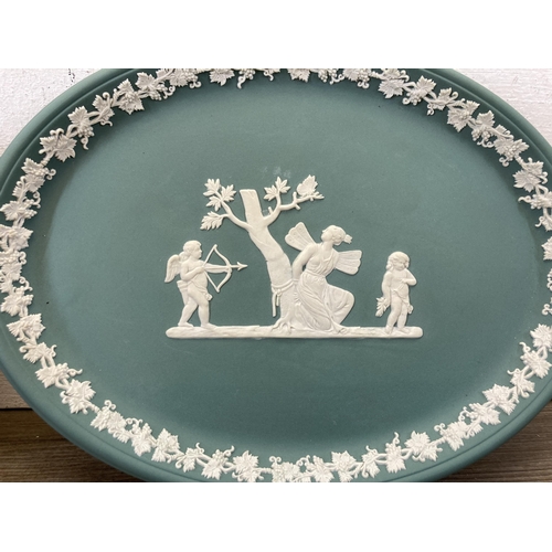 427 - A collection of Wedgwood sage green and teal Jasperware