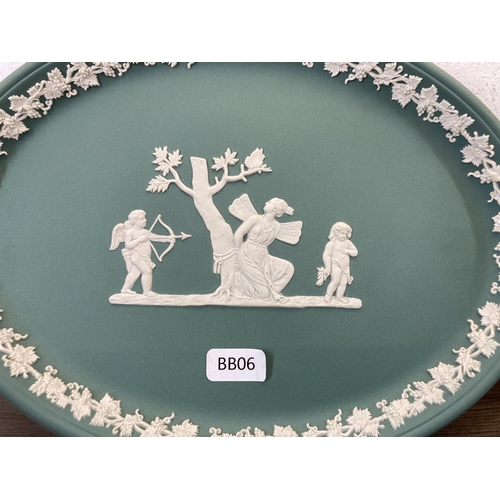 427 - A collection of Wedgwood sage green and teal Jasperware