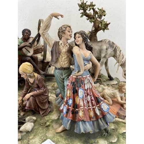 429 - A large 1970s Capodimonte 'The Gypsy Encampment' figurine modelled by Sandro Maggioni - approx. 32cm... 