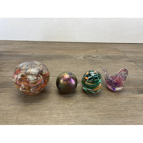 437 - Thirteen art glass paperweights to include Waterford squirrel, Kerry Glass bird, Millefiori etc.