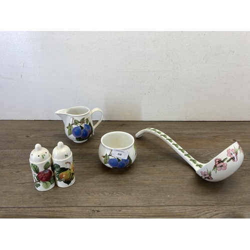 438 - A collection of Portmeirion Pomona pottery to include six storage jars, ladle, salt and pepper shake... 