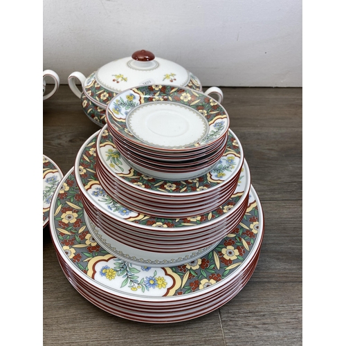 440 - A collection of Minton Oriental Blossom dinnerware to include six tea cups, six saucers, six side pl... 