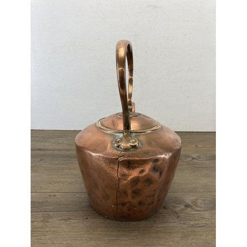 452 - A Victorian copper kettle - approx. 32cm high