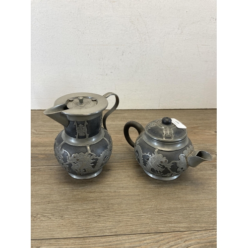 453 - A Chinese Wen Hua Shun pewter and ceramic four piece tea set