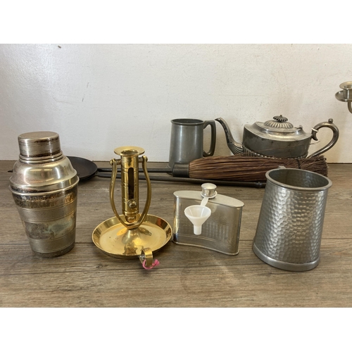 456 - A collection of metalware to include P. H. V & Co. EPNS cocktail shaker, pewter three branch candela... 