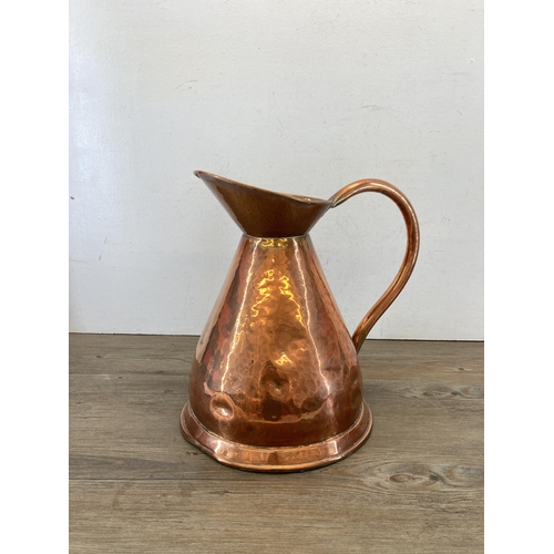 480 - A Victorian copper jug - approx. 35cm high