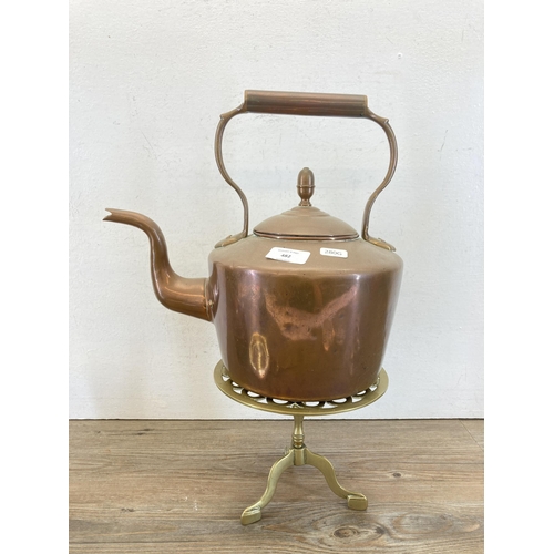 482 - A collection of metalware to include Victorian William Soutter & Sons copper kettle, brass trivet st... 