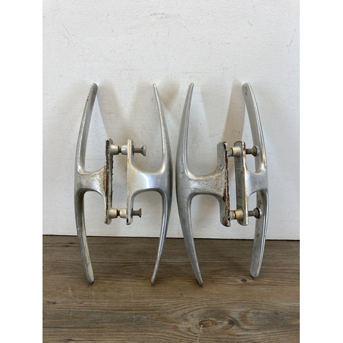 485A - Ten mid 20th century Dryad aluminium door handles together with a brass wall hanging bell